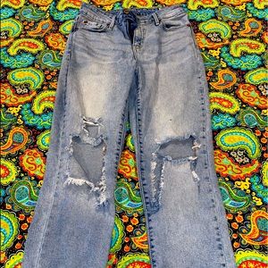 Light wash jean short with ripping in knees